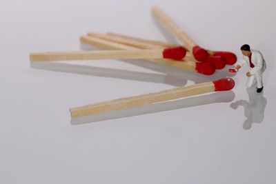 Close-up of colored pencils on white background