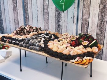 High angle view of various dessert on table