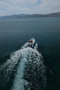 High angle view of nautical vessel on sea against sky