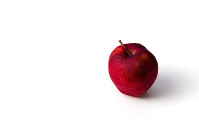 Close-up of apple against white background