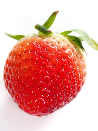 Close-up of strawberries on white background