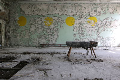 Table in room of abandoned building