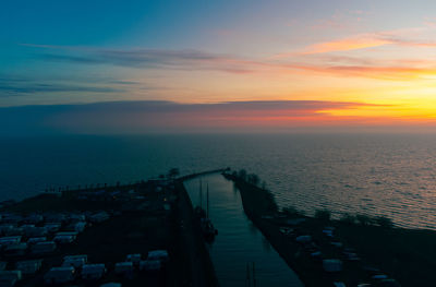 High angle view of cityscape against sky during sunset. edammersluis, edam, nederland