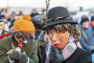 Carnival in carnia. sauris, masks of the religious and pagan tradition. italy