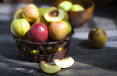 Delicious fresh peaches on the rustic wooden table