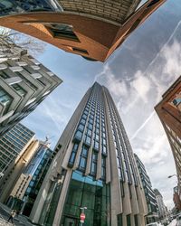 Low angle view of skyscrapers against sky