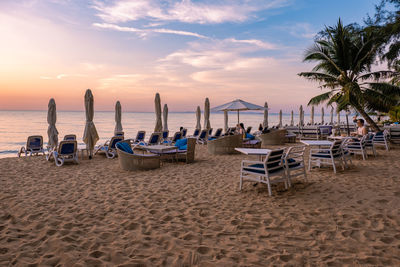 Scenic view of beach against sky during sunset