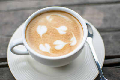 Close-up of cappuccino on table