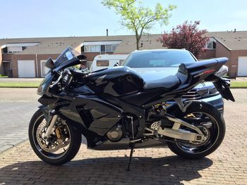 Side view of motorcycle on street