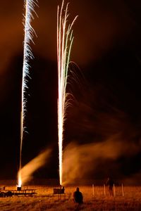 Firework display at night