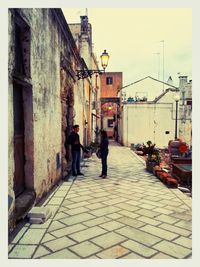 Woman walking on city street