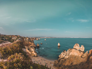 Scenic view of bay against sky