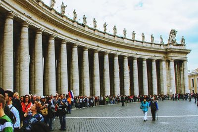 Group of people in front of historical building