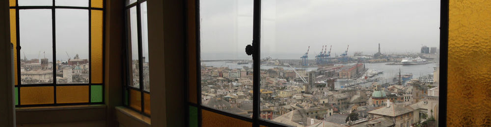 Buildings seen through glass window