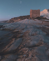 Scenic view of sea against sky at night