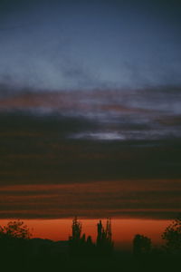 Scenic view of silhouette landscape against sky during sunset