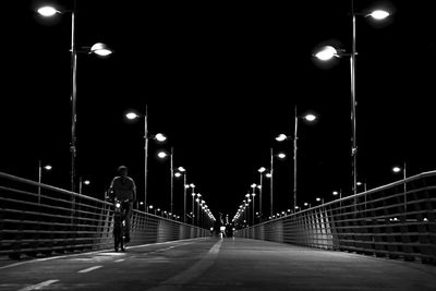 Illuminated street lights at night