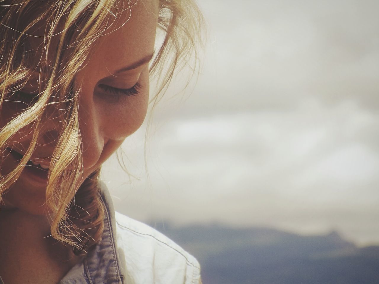 young adult, lifestyles, young women, person, headshot, leisure activity, focus on foreground, close-up, long hair, looking at camera, beauty, portrait, front view, contemplation, human face, side view