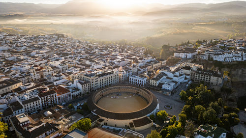 High angle view of cityscape against sky during sunset