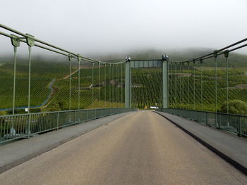 Suspension bridge during foggy weather