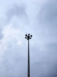 Low angle view of floodlight against sky