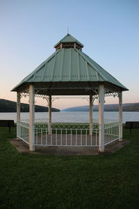 Built structure on beach against clear sky