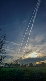 Scenic view of vapor trails in sky