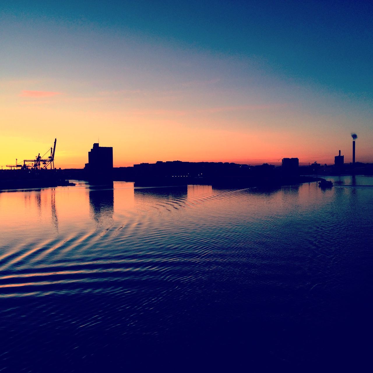 sunset, water, silhouette, reflection, sky, river, architecture, built structure, building exterior, outdoors, no people, waterfront, nautical vessel, nature, city, beauty in nature, scenics, harbor, cityscape, day