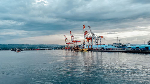 Boats in sea against sky