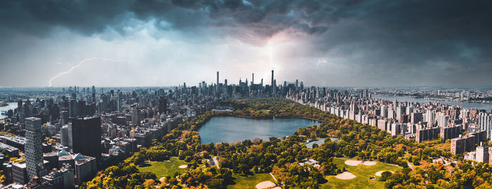 Central park aerial view in manhattan, new york during a heavy storm, lightning.