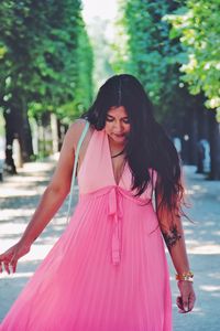 Young woman standing on street