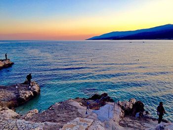 Scenic view of sea at sunset