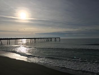 Scenic view of sea against sky at sunset