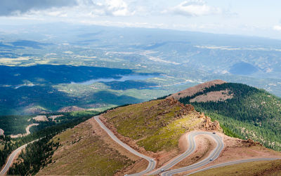 Aerial view of mountain road against sky