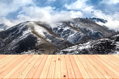 Scenic view of snowcapped mountains against sky