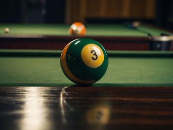 Close-up of pool balls on table