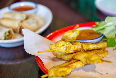 Close-up of food served on table