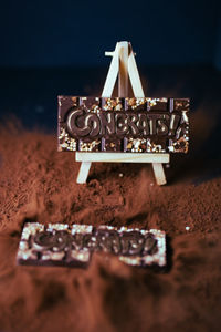 Close-up of guitar on table