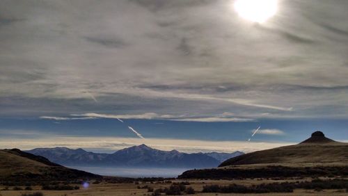 Scenic view of mountains against sky during sunset