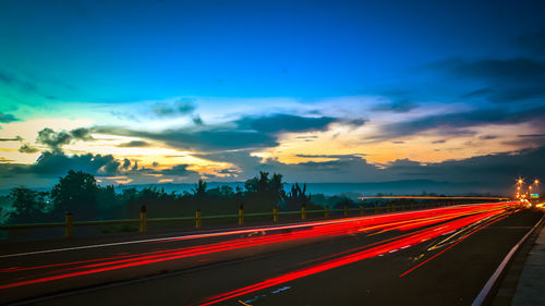 Road against sky at sunset