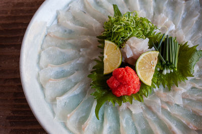 High angle view of strawberries in plate