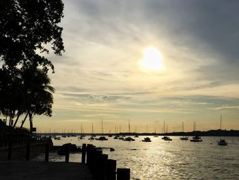 Silhouette of harbor at sunset