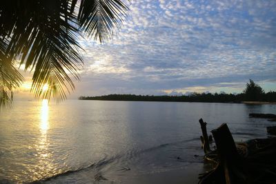 Scenic view of sea against sky at sunset