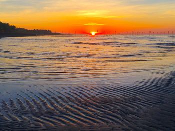 Scenic view of sea during sunset