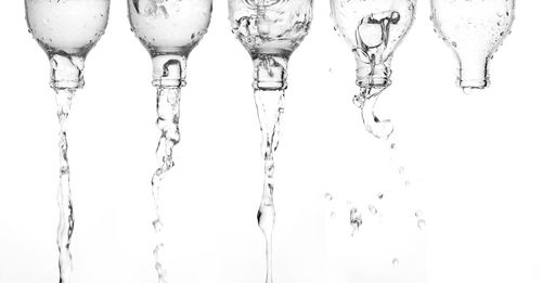 Close-up of water drops on white background