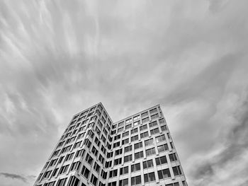 Low angle view of modern buildings against sky