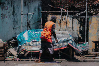 Rear view of people working in bus