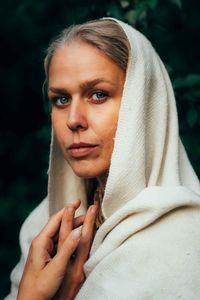 Portrait of young woman looking away