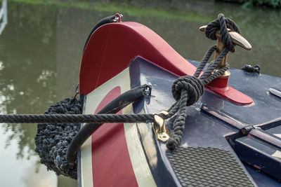 Cropped image of boat moored in canal