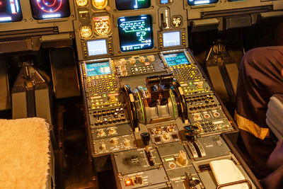 Aerial view of illuminated airplane at night